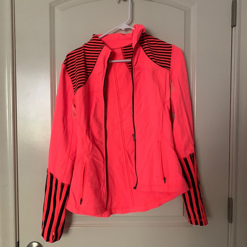 Lululemon size 6 define jacket orange. Perfect condition no rips or holes.